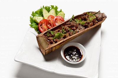 Bò nướng ống tre